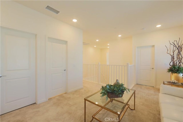 living room with light colored carpet