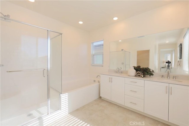 bathroom featuring separate shower and tub, tile patterned floors, and vanity