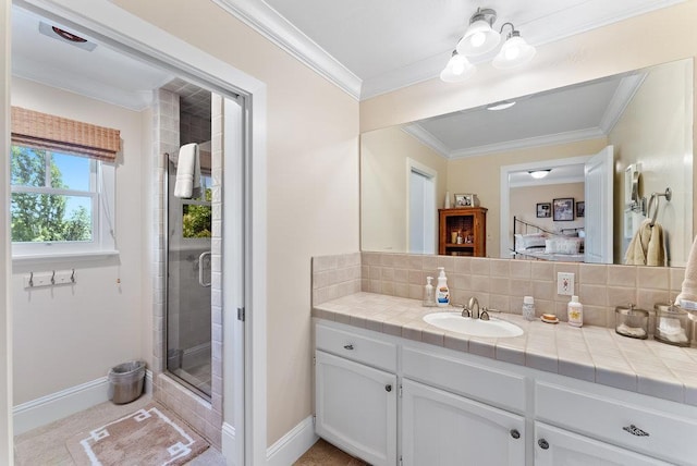 bathroom with ornamental molding, a shower with shower door, vanity, and backsplash