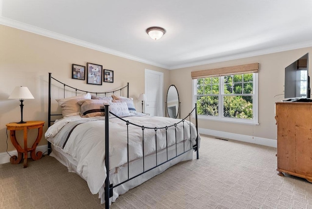 bedroom with crown molding and light carpet