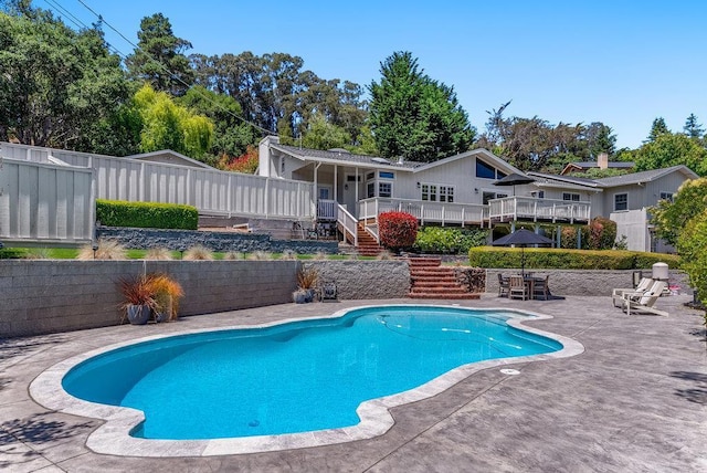 view of swimming pool featuring a patio