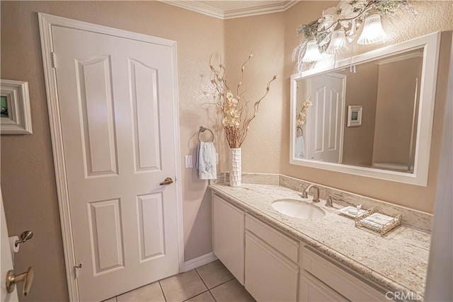 bathroom featuring tile patterned flooring, vanity, and ornamental molding