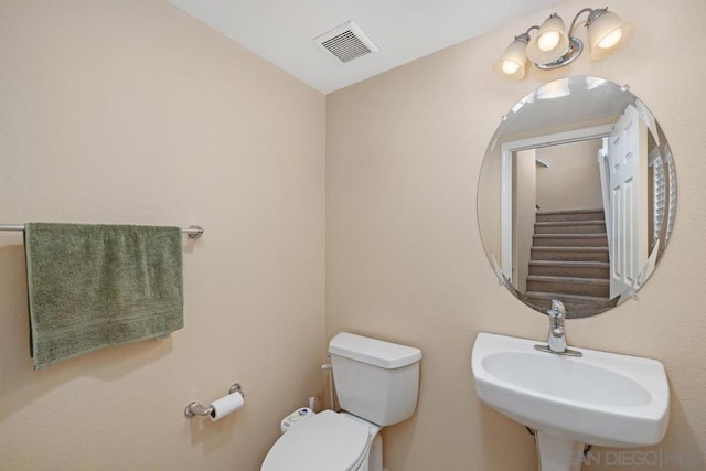 bathroom with sink and toilet