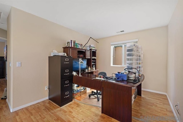 office space featuring light hardwood / wood-style floors