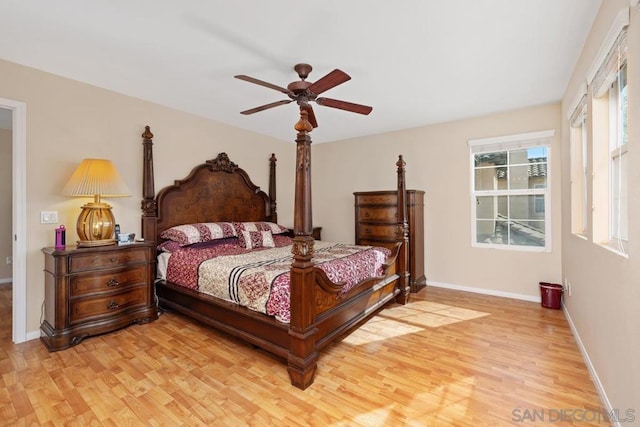 bedroom featuring light wood-type flooring and ceiling fan