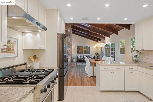 kitchen featuring wood ceiling, white cabinetry, stainless steel appliances, kitchen peninsula, and lofted ceiling with beams