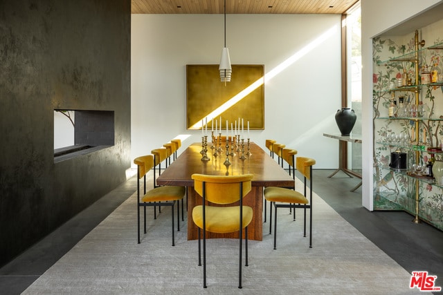 dining room with wooden ceiling