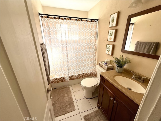 full bathroom with shower / bath combo with shower curtain, toilet, vanity, and tile patterned flooring