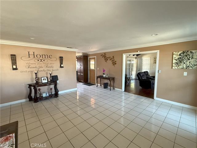 tiled spare room with crown molding