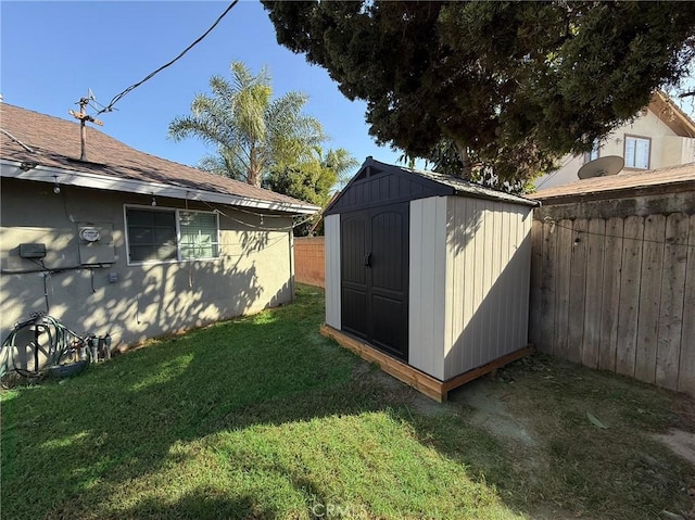 view of outdoor structure with a lawn