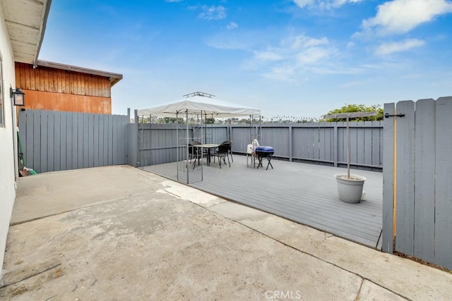 view of patio with a wooden deck