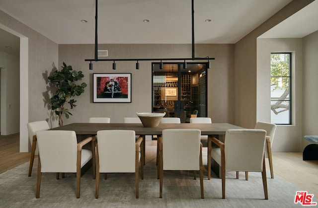 dining room with light hardwood / wood-style flooring