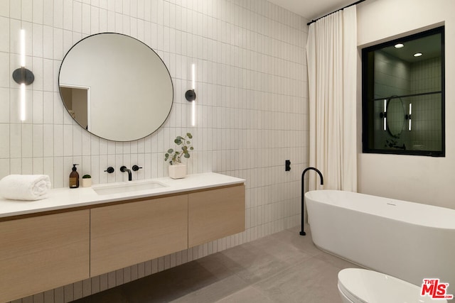 bathroom featuring a tub to relax in, tile walls, decorative backsplash, and tile patterned flooring