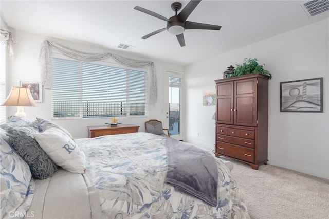 bedroom with light colored carpet and ceiling fan