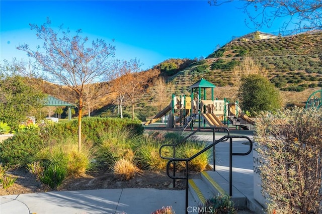 view of play area with a mountain view