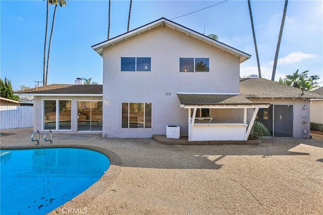 back of property featuring a patio