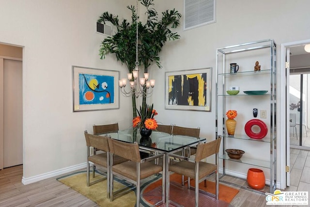 dining space with light hardwood / wood-style flooring