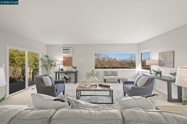 living room featuring light colored carpet, a wall unit AC, and a wealth of natural light