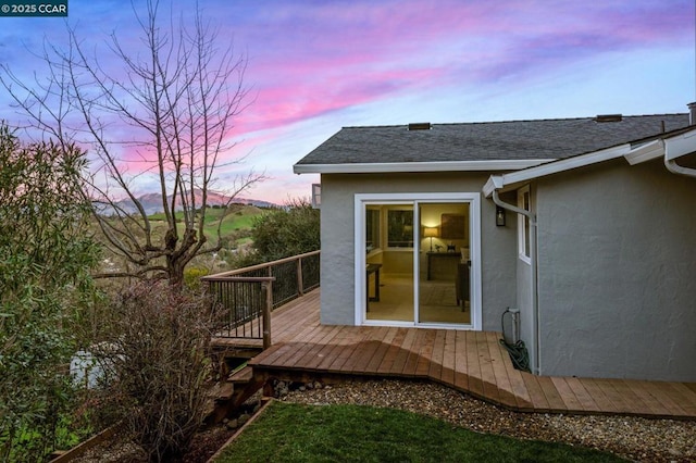 view of deck at dusk