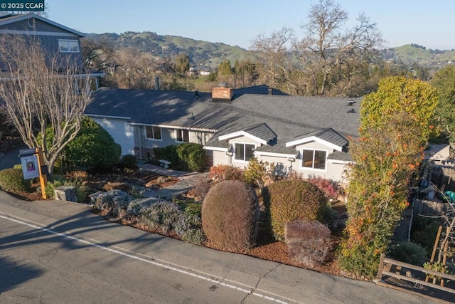 view of front of house with a mountain view