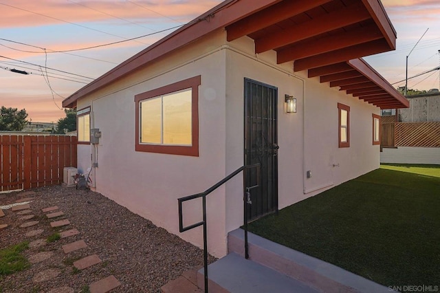 view of property exterior at dusk