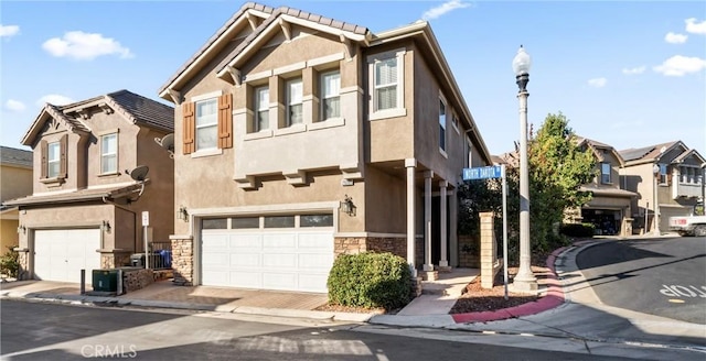 townhome / multi-family property featuring a garage