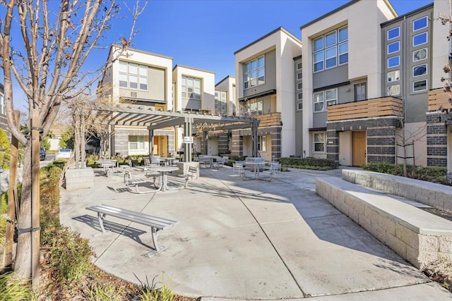 view of home's community with a pergola