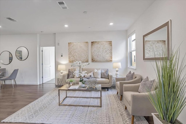 living room featuring dark hardwood / wood-style floors