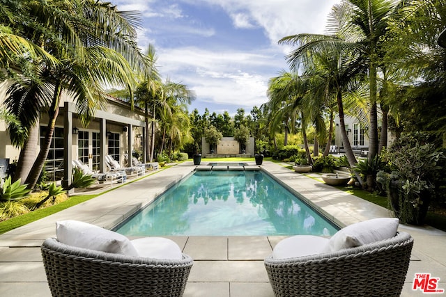 view of pool with a patio area