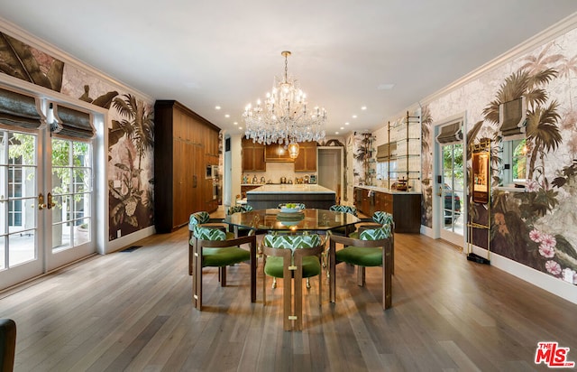 dining room featuring french doors, ornamental molding, and dark wood-type flooring