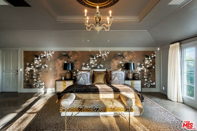 bedroom with an inviting chandelier, multiple windows, a tray ceiling, and parquet flooring