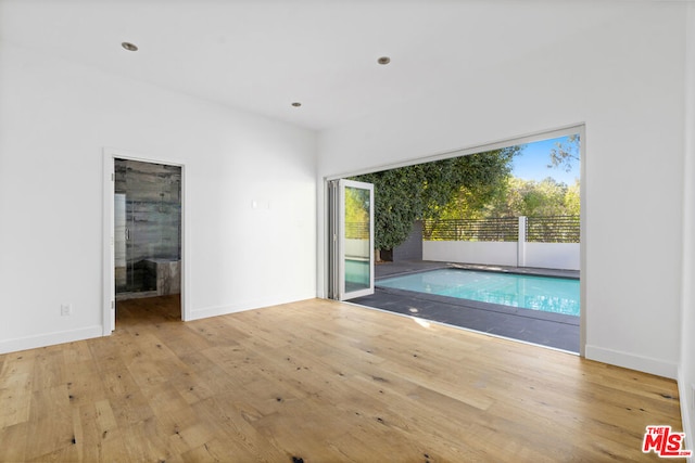 empty room featuring light hardwood / wood-style floors