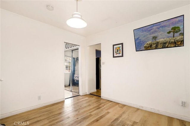 empty room featuring light hardwood / wood-style floors