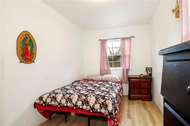 bedroom featuring light hardwood / wood-style flooring