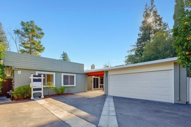 ranch-style home with a garage