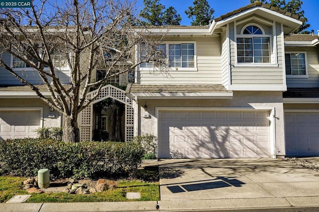 view of front of property with a garage