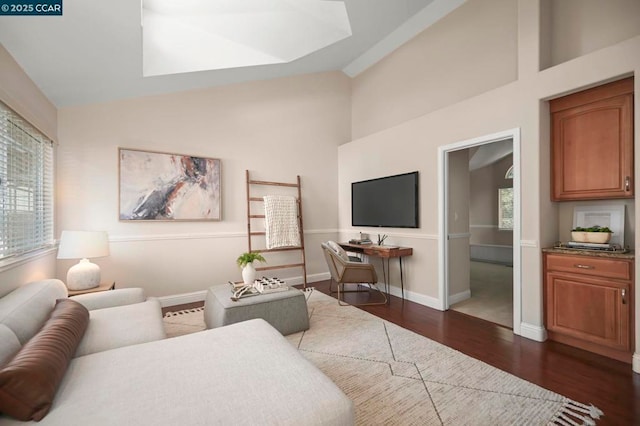 living room with dark hardwood / wood-style floors and lofted ceiling