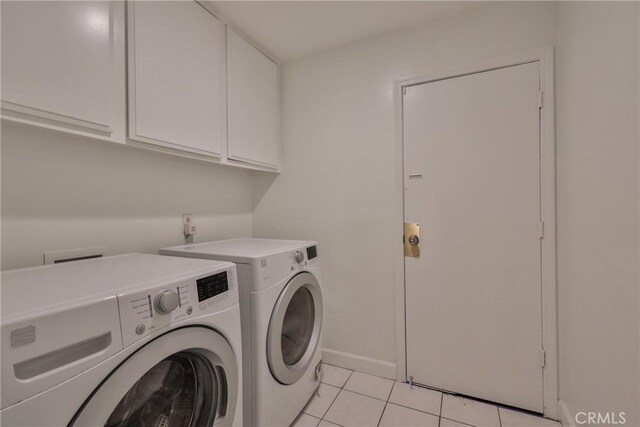 3179 Canal Point Dr, Hacienda Heights, CA 91745 - laundry room featuring cabinet space, washer and clothes dryer, light tile patterned flooring, and baseboards