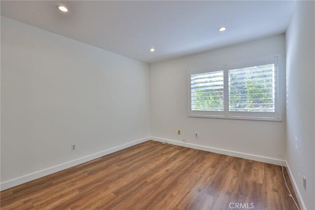 3179 Canal Point Dr, Hacienda Heights, CA 91745 - unfurnished room featuring baseboards, wood finished floors, and recessed lighting