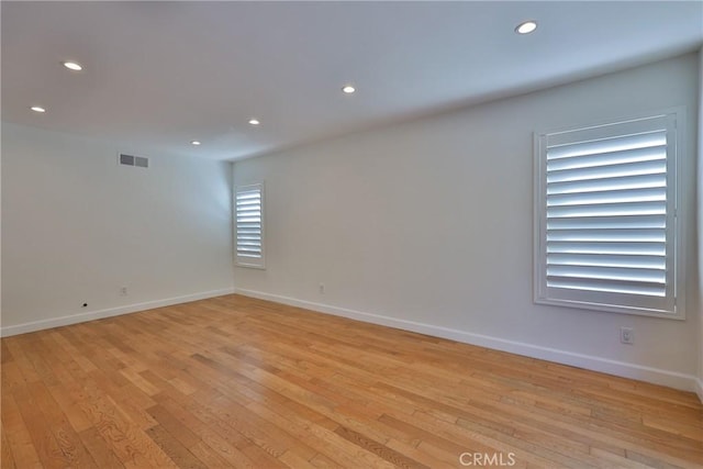 empty room featuring light hardwood / wood-style floors