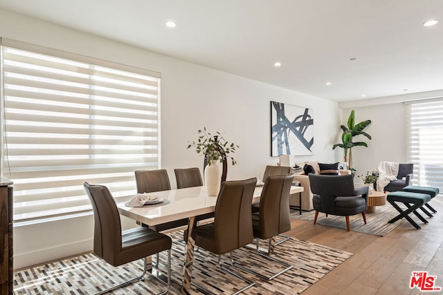 dining area with light hardwood / wood-style floors