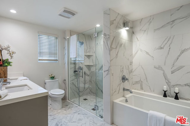 full bathroom with vanity, toilet, and separate shower and tub