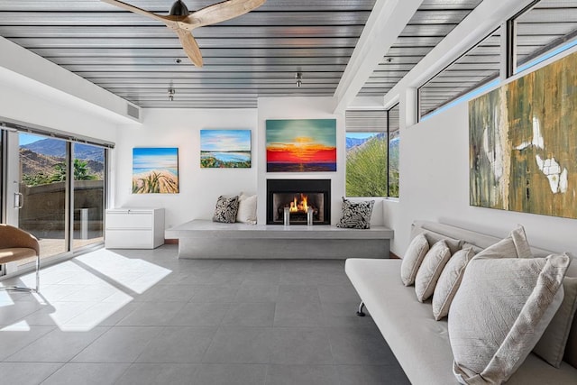 living room featuring ceiling fan