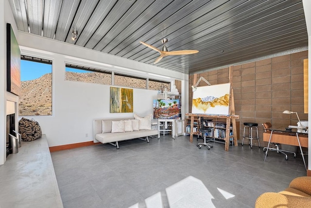 sunroom / solarium with ceiling fan