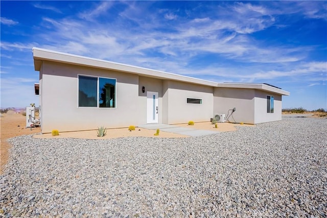 back of house featuring a patio