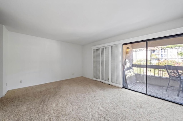 unfurnished room with carpet floors
