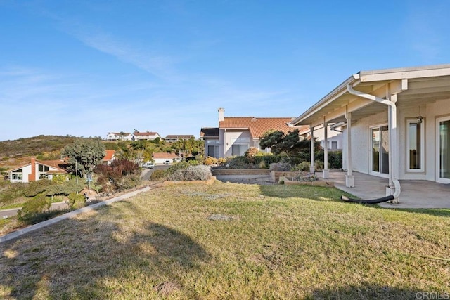 view of yard with a patio area