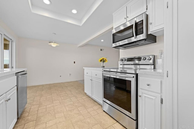 kitchen with white cabinetry and stainless steel appliances