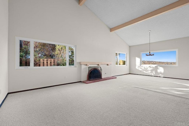 unfurnished living room with beamed ceiling, carpet floors, a textured ceiling, and high vaulted ceiling