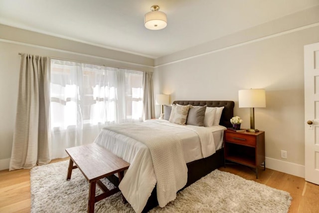 bedroom featuring light hardwood / wood-style floors